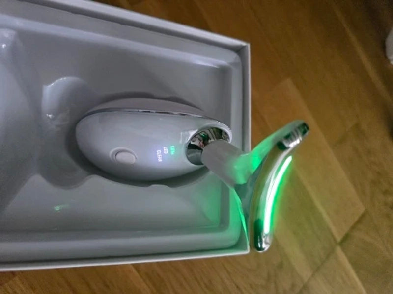 Customer photo of the device in its box with the light on